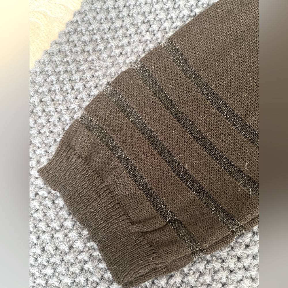 BNWOT Black sweater with sparkling transparent stripes.